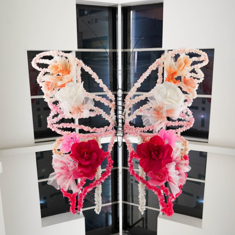Giant floral butterfly floating above